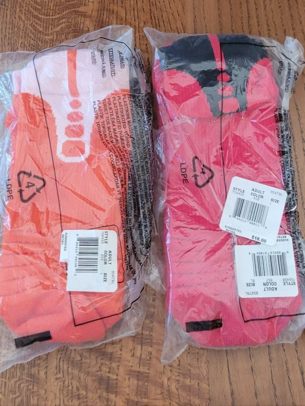 2 pair Nike peeformance basketball socks - orange & white, red & black